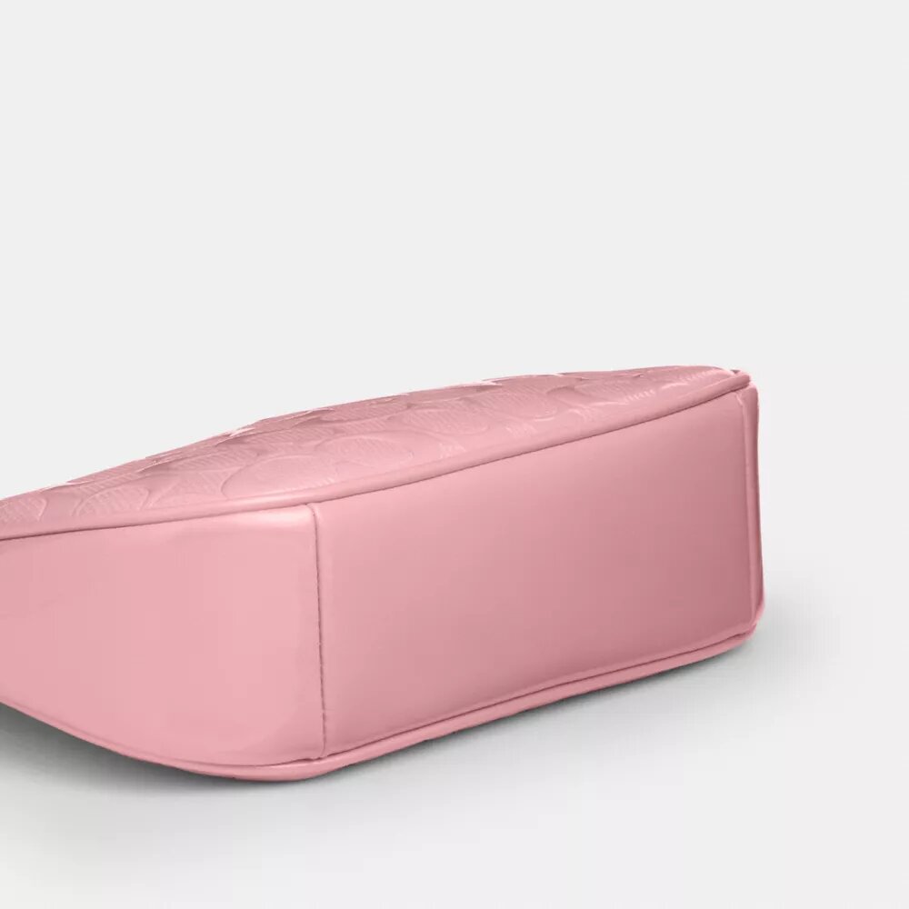 Mini sac bandoulière Teri en cuir emblématique avec breloque en forme de cœur