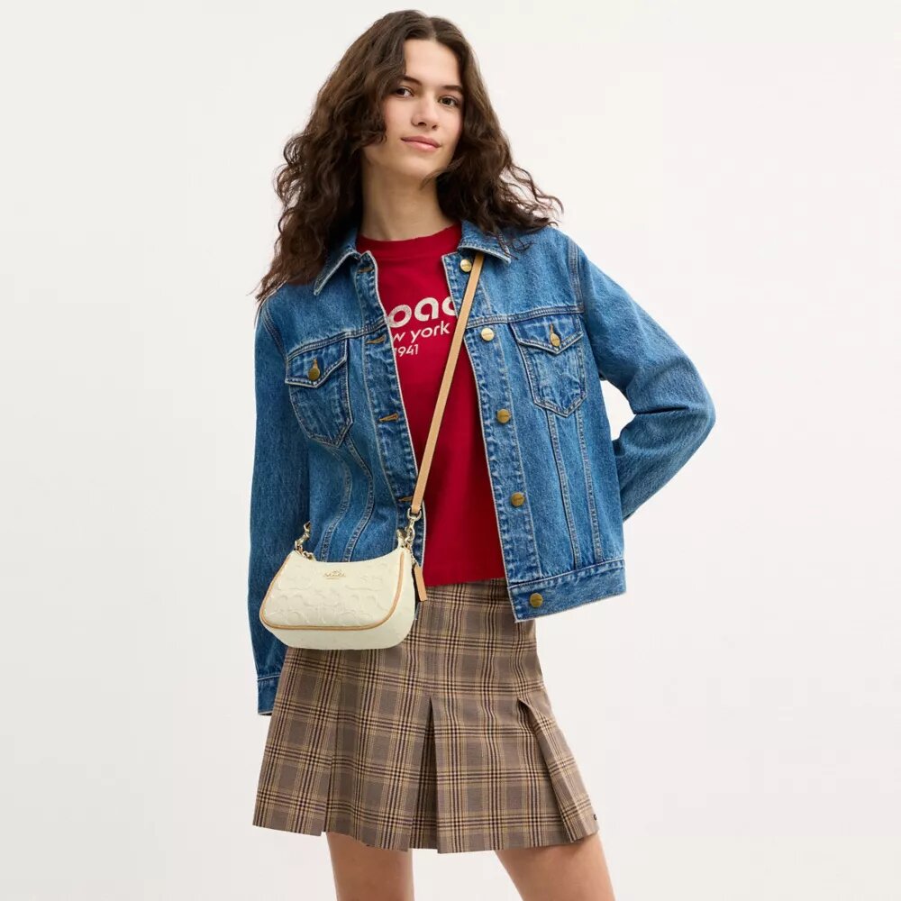 Mini sac bandoulière Teri en cuir signature