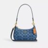 Mini sac à bandoulière Teri en denim emblématique