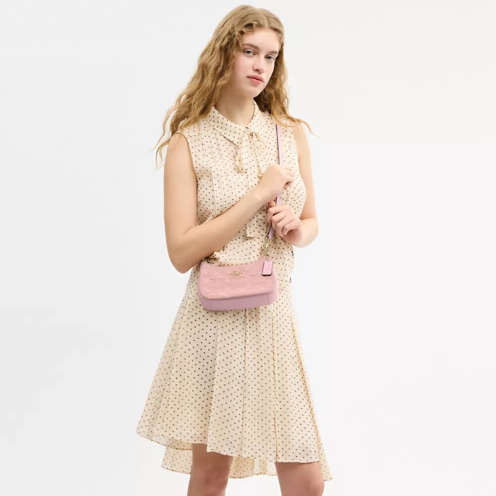 Mini sac à bandoulière Teri en denim emblématique
