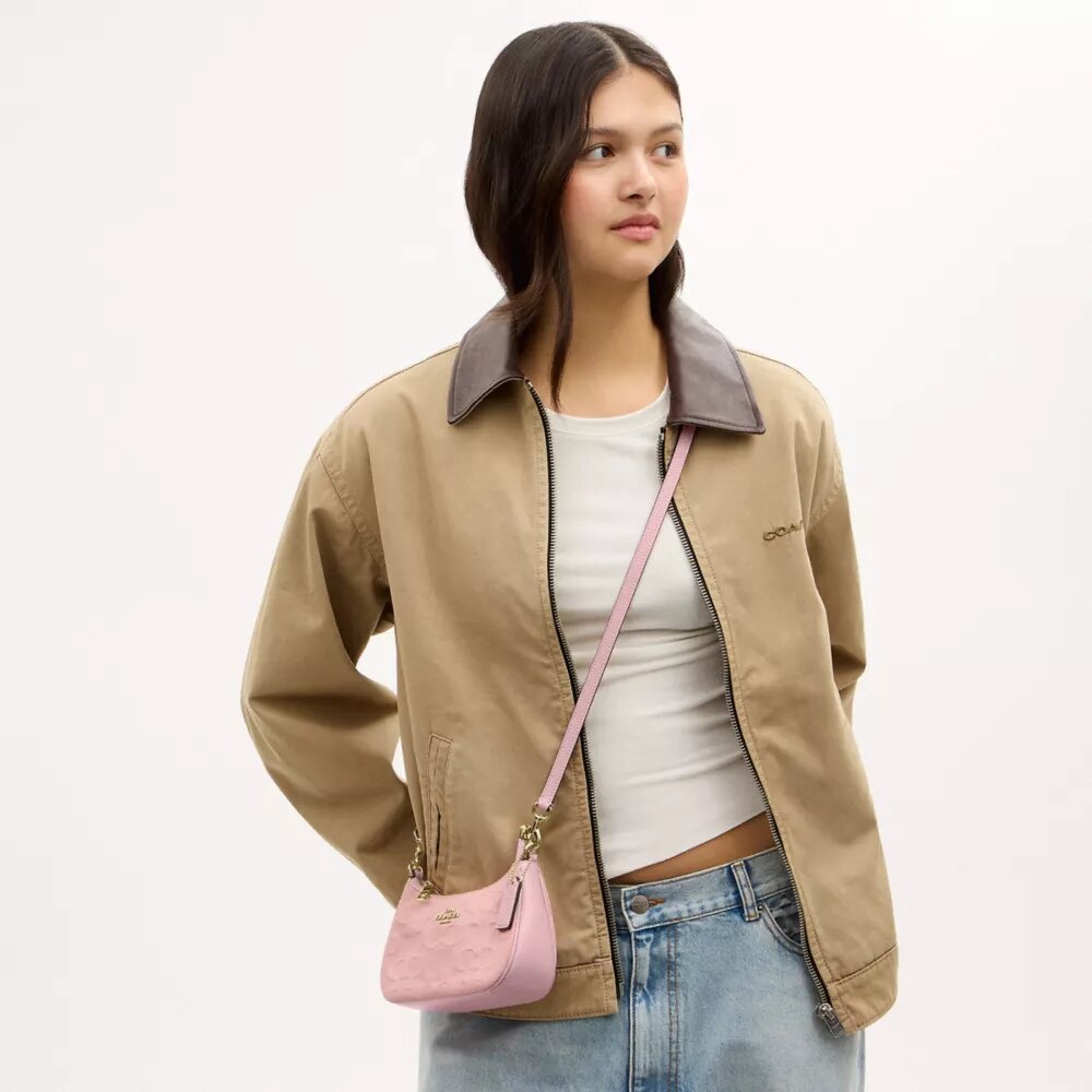 Mini sac à bandoulière Teri en denim emblématique