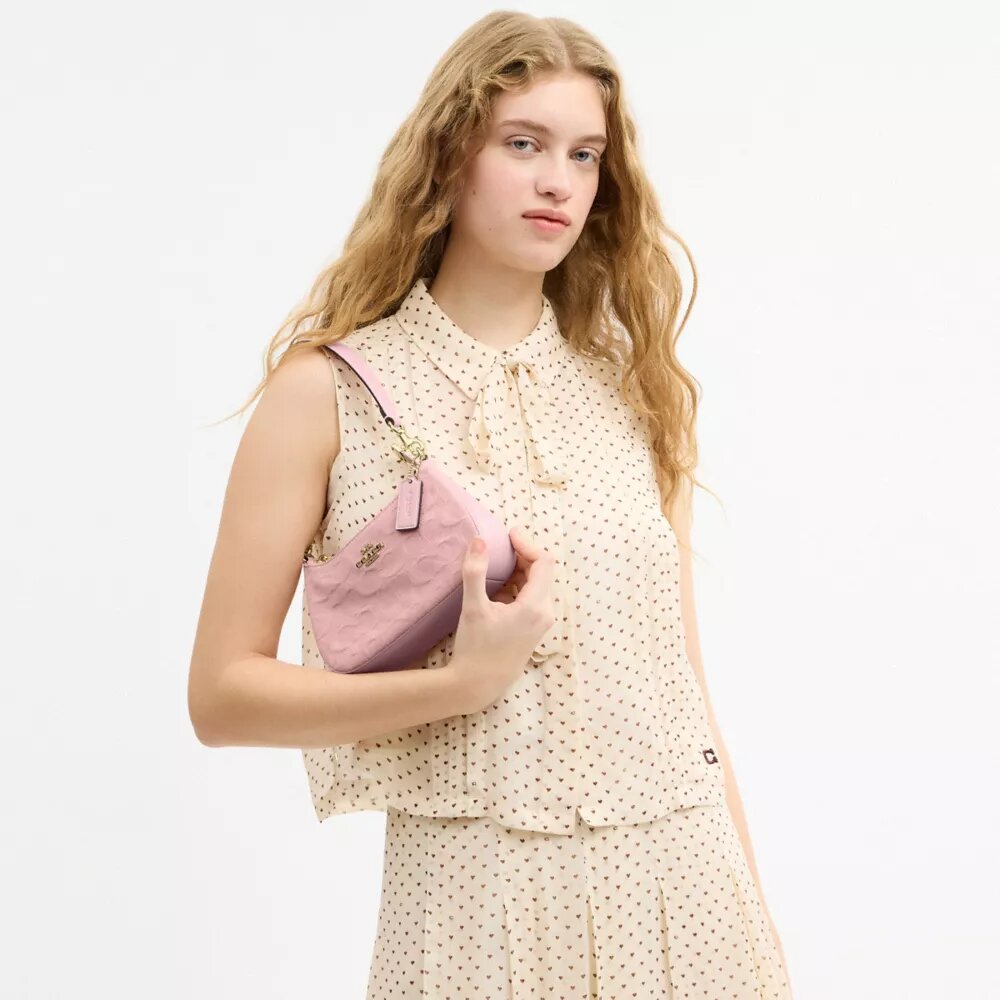 Mini sac à bandoulière Teri en denim emblématique