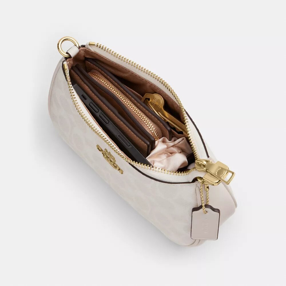 Mini sac bandoulière Teri en Signature Canvas