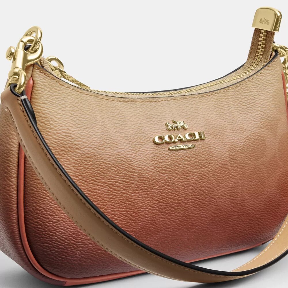 Mini sac à bandoulière Teri en Signature Canvas ombrée