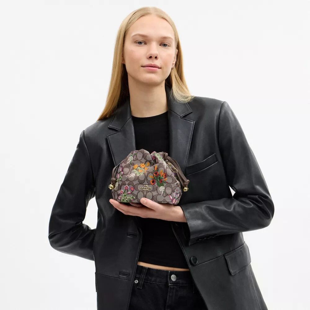 Mini-sac à cordon Faye en jacquard emblématique avec broderie florale