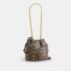 Mini-sac à cordon Faye en jacquard emblématique avec broderie florale