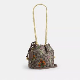 Mini-sac à cordon Faye en jacquard emblématique avec broderie florale