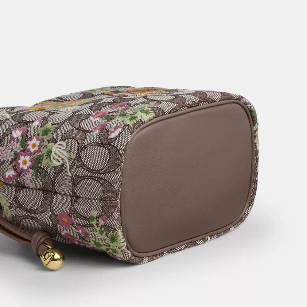 Mini-sac à cordon Faye en jacquard emblématique avec broderie florale