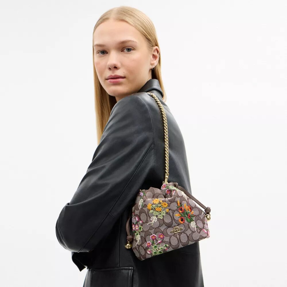 Mini-sac à cordon Faye en jacquard emblématique avec broderie florale