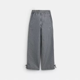 Pantalon à carreaux « Loop » de Coachtopia