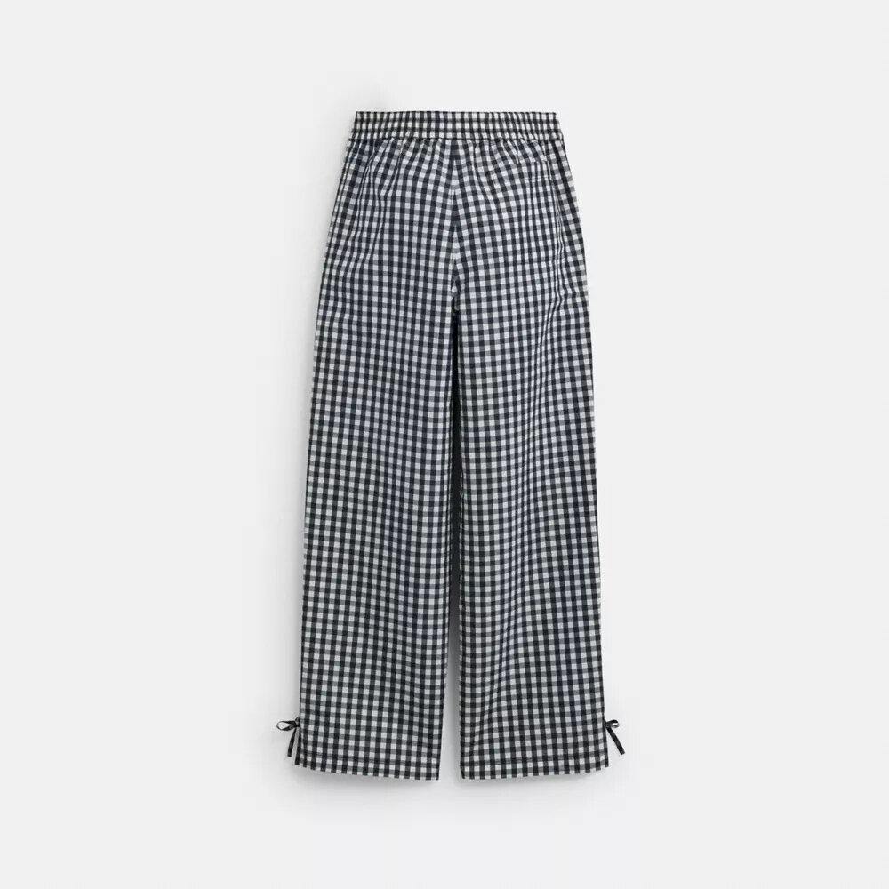 Pantalon à carreaux « Loop » de Coachtopia