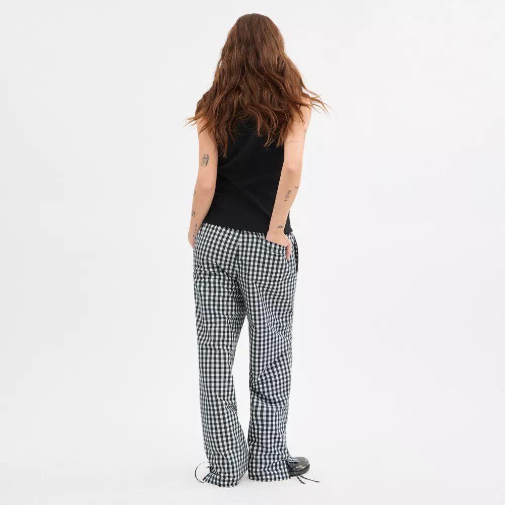 Pantalon à carreaux « Loop » de Coachtopia