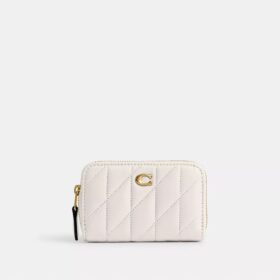 Petit porte-cartes indispensable à fermeture éclair avec matelassage en forme de coussin