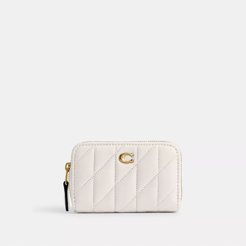 Petit porte-cartes indispensable à fermeture éclair avec matelassage en forme de coussin