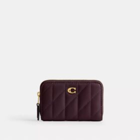 Petit porte-cartes indispensable à fermeture éclair avec matelassage en forme de coussin