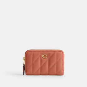 Petit porte-cartes indispensable à fermeture éclair avec matelassage en forme de coussin