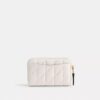 Petit porte-cartes indispensable à fermeture éclair avec matelassage en forme de coussin