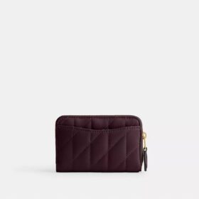 Petit porte-cartes indispensable à fermeture éclair avec matelassage en forme de coussin