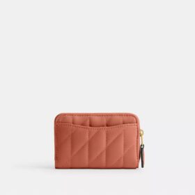 Petit porte-cartes indispensable à fermeture éclair avec matelassage en forme de coussin