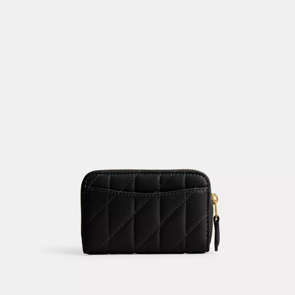Petit porte-cartes indispensable à fermeture éclair avec matelassage en forme de coussin