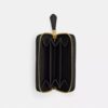 Petit porte-cartes indispensable à fermeture éclair avec matelassage en forme de coussin