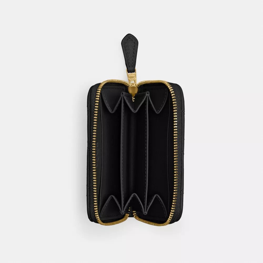 Petit porte-cartes indispensable à fermeture éclair avec matelassage en forme de coussin