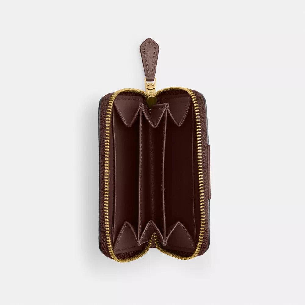 Petit porte-cartes indispensable à fermeture à glissière sur tout le pourtour en Signature Canvas