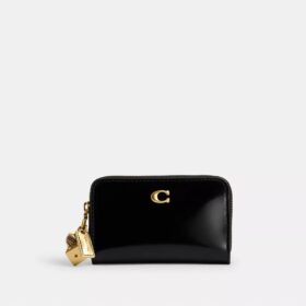Petit portefeuille zippé Essential avec Charms