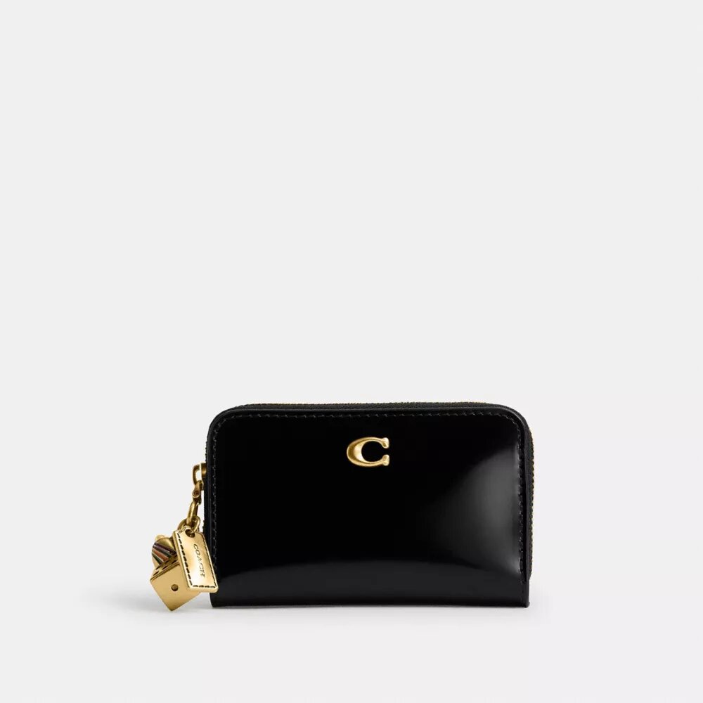 Petit portefeuille zippé Essential avec Charms