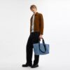 Petit sac cabas de voyage en denim emblématique