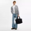Petit sac cabas de voyage en denim emblématique
