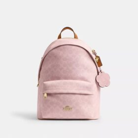 Petit sac à dos Taylor en Signature Canvas avec Charms