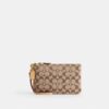 Petite pochette dragonne Essential en jacquard emblématique