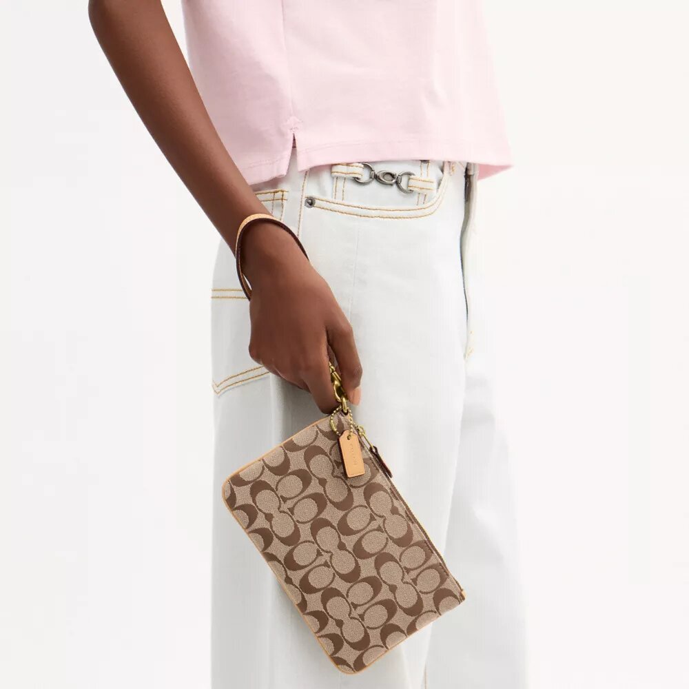 Petite pochette dragonne Essential en jacquard emblématique