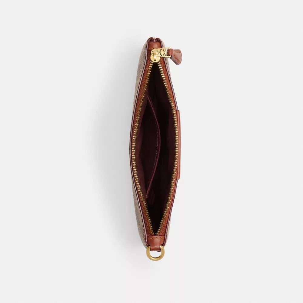 Petite pochette dragonne Essential en Signature Canvas