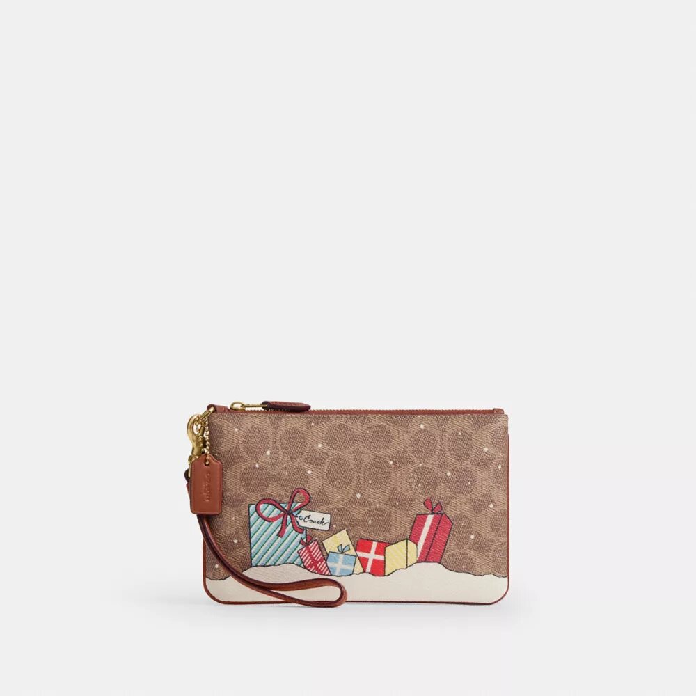 Petite pochette dragonne Essential en Signature Canvas avec cadeaux de Noël