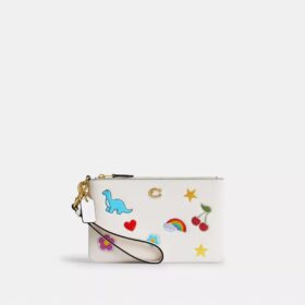 Petite pochette dragonne indispensable à imprimé autocollants