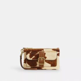 Pochette dragonne Ashton en cuir de veau velours à imprimé vache