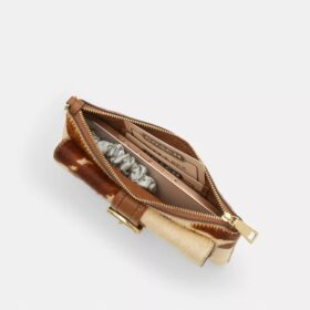 Pochette dragonne Ashton en cuir de veau velours à imprimé vache