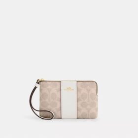Pochette dragonne avec fermeture à glissière en coin en Signature Canvas à rayures