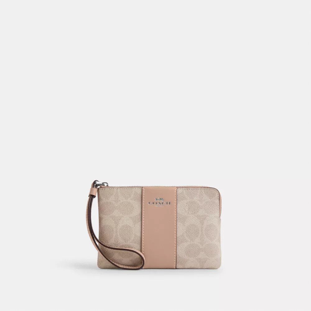 Pochette dragonne avec fermeture à glissière en coin en Signature Canvas à rayures
