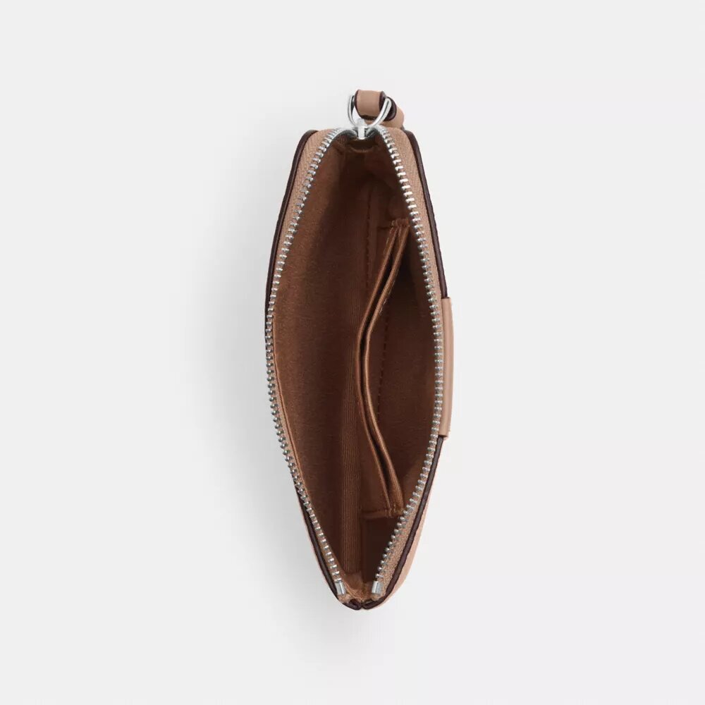 Pochette dragonne avec fermeture à glissière en coin en Signature Canvas à rayures