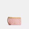 Pochette dragonne à double fermeture éclair avec imprimé floral