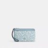 Pochette dragonne à double fermeture éclair avec imprimé floral