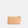 Pochette dragonne à double fermeture éclair avec imprimé floral