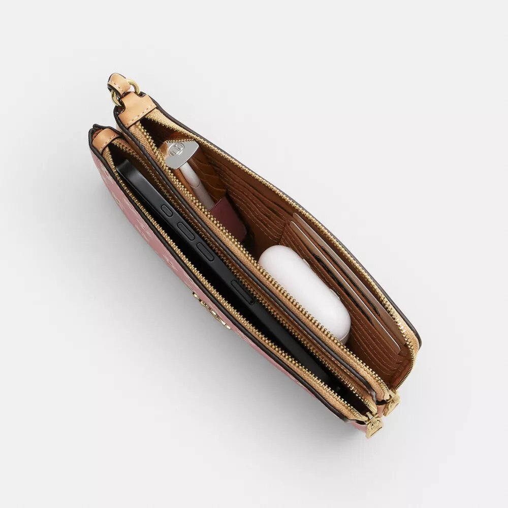 Pochette dragonne à double fermeture éclair avec imprimé floral