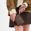 Pochette dragonne à fermeture éclair d'angle