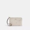 Pochette dragonne à fermeture éclair d'angle avec imprimé étoiles