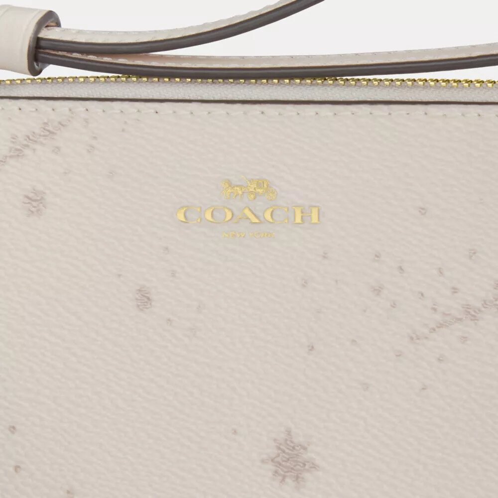 Pochette dragonne à fermeture éclair d'angle avec imprimé étoiles