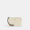 Pochette dragonne à fermeture éclair d'angle en cuir emblématique